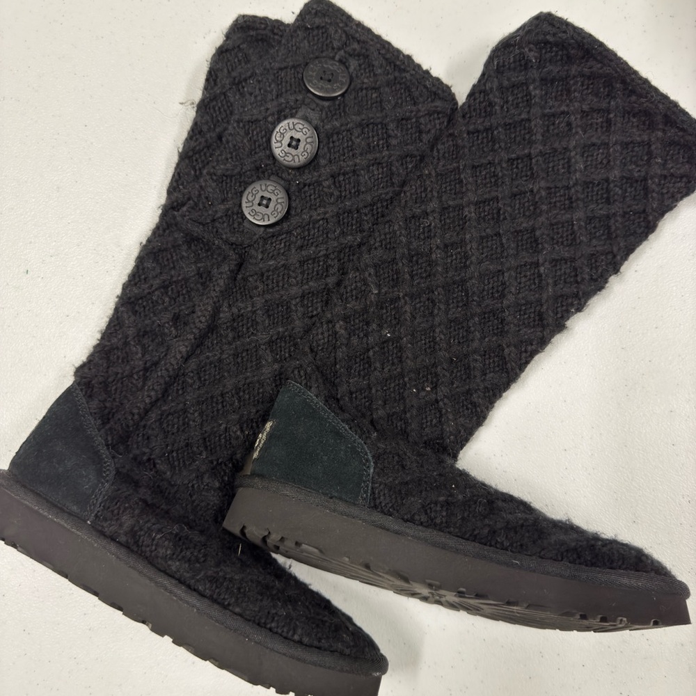 Black Ugg sock boots.